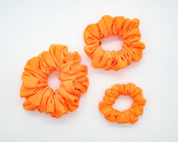 Gumicka neonove oranzova_2 Gumička neonový plamen