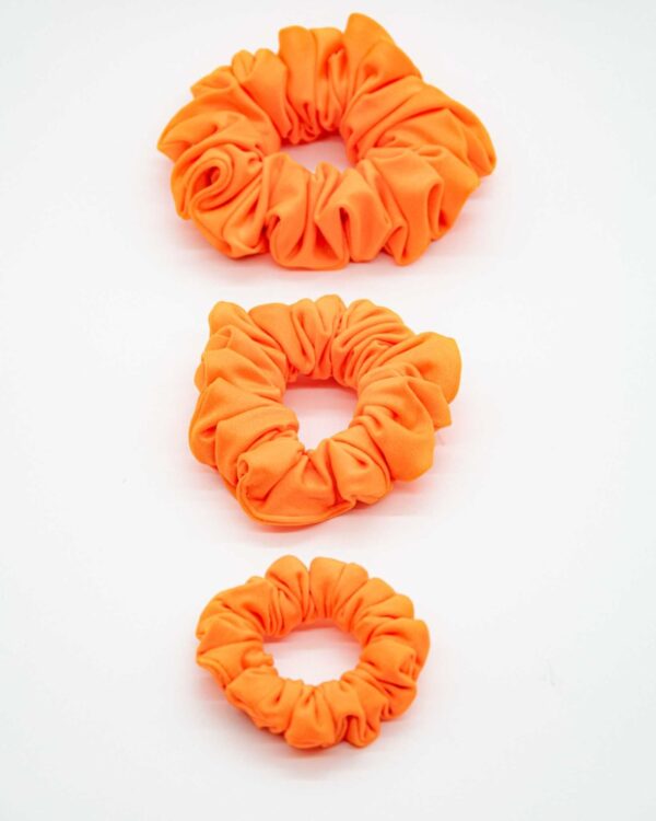 Gumicka neonove oranzova_3 Gumička neonový plamen